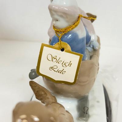 LOT 46: Boxed Porcelain Figurines: Paul Sebastian Collection, Hummel Club & More