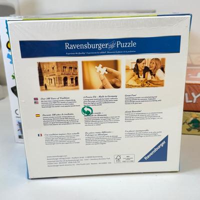 LOT 56: Collection of Games & Ravensberger Puzzle w/ Stow & Go Mat