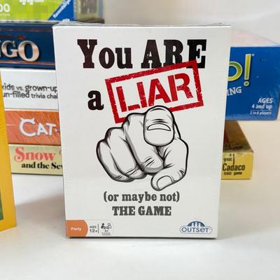 LOT 56: Collection of Games & Ravensberger Puzzle w/ Stow & Go Mat