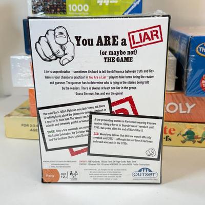 LOT 56: Collection of Games & Ravensberger Puzzle w/ Stow & Go Mat