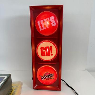 LOT 60: Let's Go Cavaliers Red Light Sign, Basketball Court Stencil, Proforce Blue Boxing Gloves & More