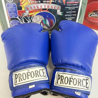 LOT 60: Let's Go Cavaliers Red Light Sign, Basketball Court Stencil, Proforce Blue Boxing Gloves & More