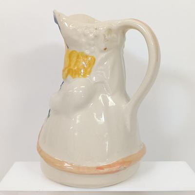 LOT 61: Shawnee Pottery Bo Peep Pitcher, Artini Arts Sculptured Engravings, Wedgwood Peter Rabbit Coin Bank & More