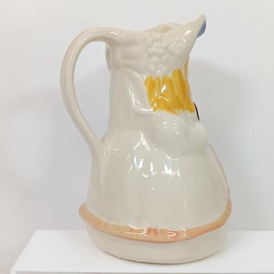 LOT 61: Shawnee Pottery Bo Peep Pitcher, Artini Arts Sculptured Engravings, Wedgwood Peter Rabbit Coin Bank & More