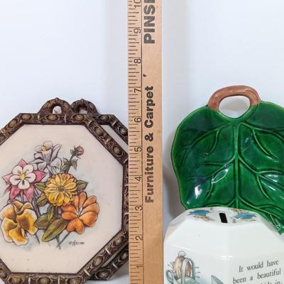 LOT 61: Shawnee Pottery Bo Peep Pitcher, Artini Arts Sculptured Engravings, Wedgwood Peter Rabbit Coin Bank & More