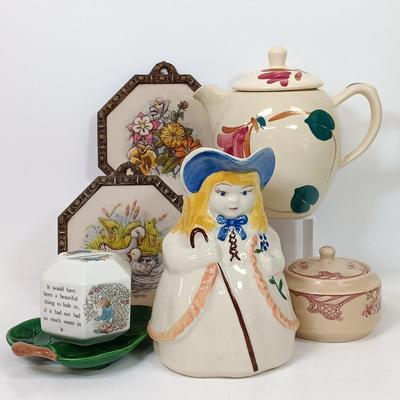 LOT 61: Shawnee Pottery Bo Peep Pitcher, Artini Arts Sculptured Engravings, Wedgwood Peter Rabbit Coin Bank & More
