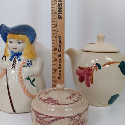 LOT 61: Shawnee Pottery Bo Peep Pitcher, Artini Arts Sculptured Engravings, Wedgwood Peter Rabbit Coin Bank & More
