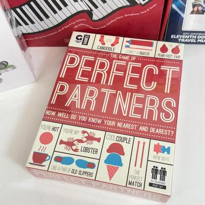 LOT 82: NIP Novelty & More: Light Bar+, Golden Girls Coasters, Roll-up Piano & More