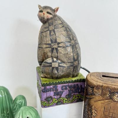 LOT 83: Jim Shore Grumpy Cat Figurine, Southwest Salt & Pepper Shakers, Bear Coin Bank & Mini Train on Horseshoe