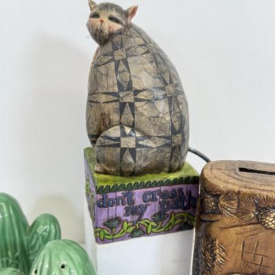 LOT 83: Jim Shore Grumpy Cat Figurine, Southwest Salt & Pepper Shakers, Bear Coin Bank & Mini Train on Horseshoe