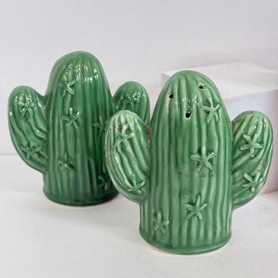 LOT 83: Jim Shore Grumpy Cat Figurine, Southwest Salt & Pepper Shakers, Bear Coin Bank & Mini Train on Horseshoe