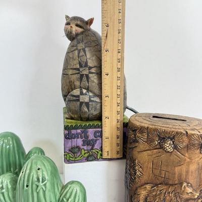 LOT 83: Jim Shore Grumpy Cat Figurine, Southwest Salt & Pepper Shakers, Bear Coin Bank & Mini Train on Horseshoe