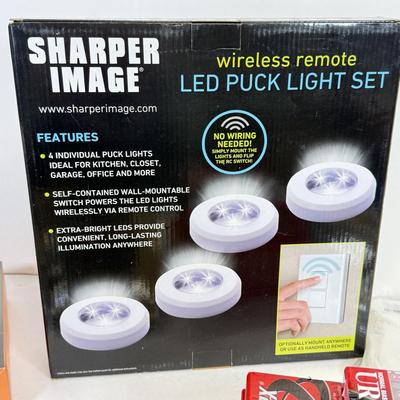 LOT 85: Office Collection: Sharper Image LED Puck Light Set, NIP Wires and Cords, Visual J++ & Toner