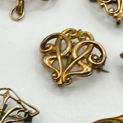 LOT 105: Collection of Antique Watch Fob Pins