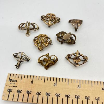 LOT 105: Collection of Antique Watch Fob Pins