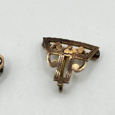 LOT 105: Collection of Antique Watch Fob Pins