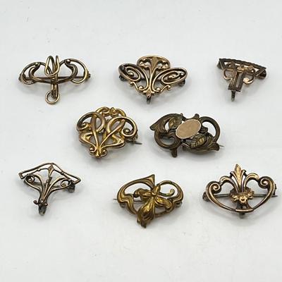 LOT 105: Collection of Antique Watch Fob Pins