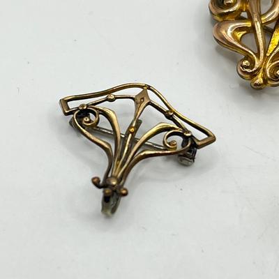 LOT 105: Collection of Antique Watch Fob Pins