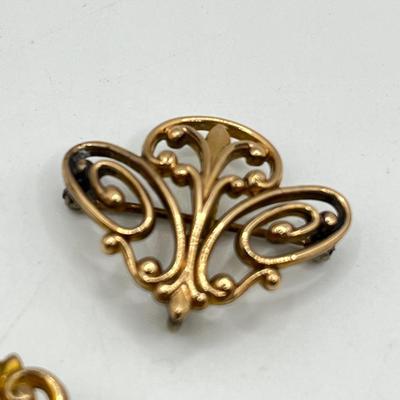 LOT 105: Collection of Antique Watch Fob Pins