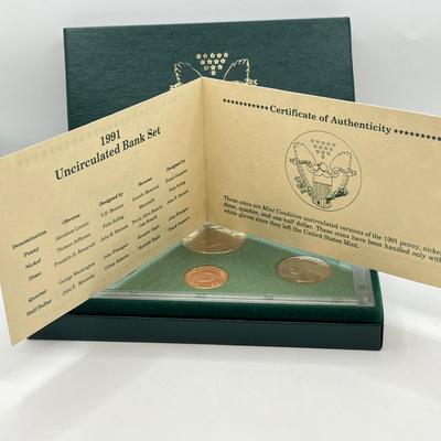 LOT 110: Collectible Coin Sets - Elvis, Susan B. Anthony and More