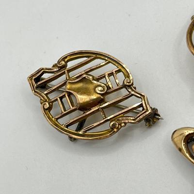 LOT 111: Collection of Antique Watch Fob Pins