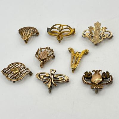 LOT 111: Collection of Antique Watch Fob Pins