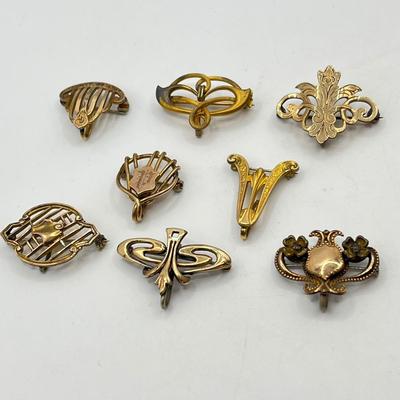 LOT 111: Collection of Antique Watch Fob Pins