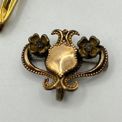 LOT 111: Collection of Antique Watch Fob Pins