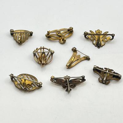 LOT 111: Collection of Antique Watch Fob Pins