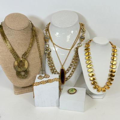 LOT 125: Goldtone Necklaces & More