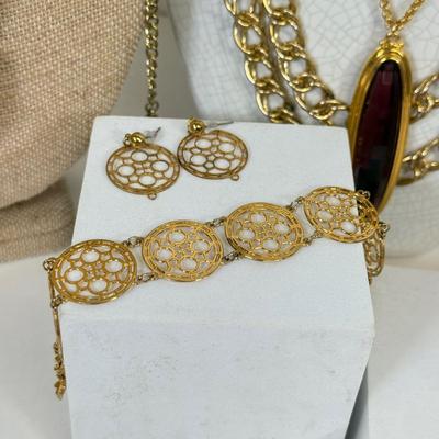 LOT 125: Goldtone Necklaces & More