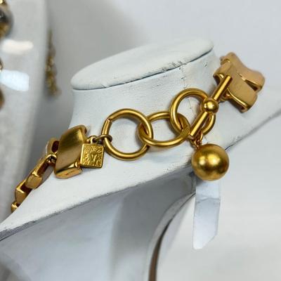 LOT 125: Goldtone Necklaces & More