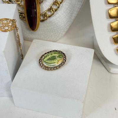 LOT 125: Goldtone Necklaces & More