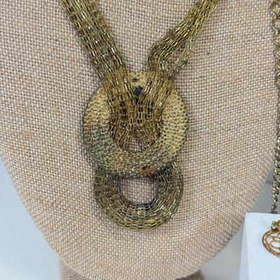 LOT 125: Goldtone Necklaces & More