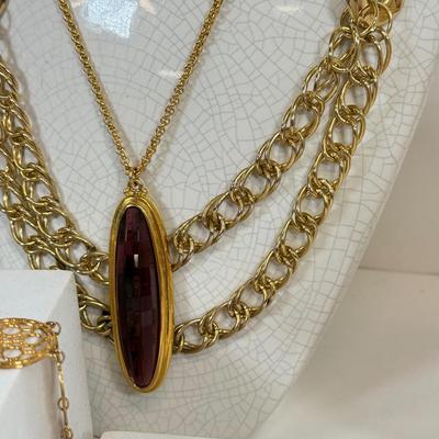 LOT 125: Goldtone Necklaces & More
