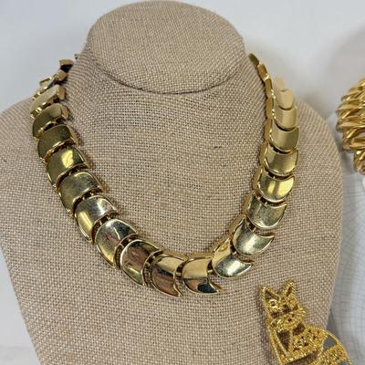 LOT 127: Gold Tone Necklaces, Brooches & Elizabeth Taylor Watch