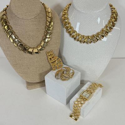 LOT 127: Gold Tone Necklaces, Brooches & Elizabeth Taylor Watch