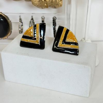 LOT 130: Collection of Pierced Earrings