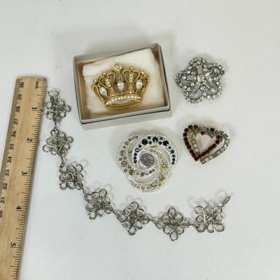 LOT 137: Kenneth Jay Lane’s Crown Pin, Rhinestone Pins/Brooches & Bracelet