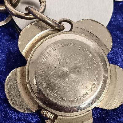 LOT 141: Vintage Keychains, Casino Coins & Travel Alarm Clocks