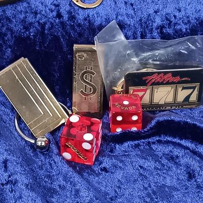 LOT 141: Vintage Keychains, Casino Coins & Travel Alarm Clocks