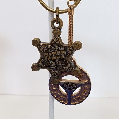 LOT 141: Vintage Keychains, Casino Coins & Travel Alarm Clocks