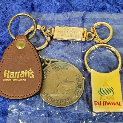 LOT 141: Vintage Keychains, Casino Coins & Travel Alarm Clocks