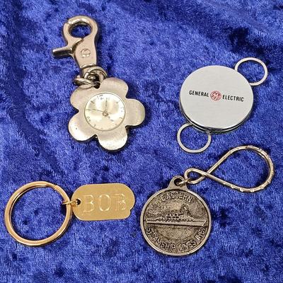 LOT 141: Vintage Keychains, Casino Coins & Travel Alarm Clocks