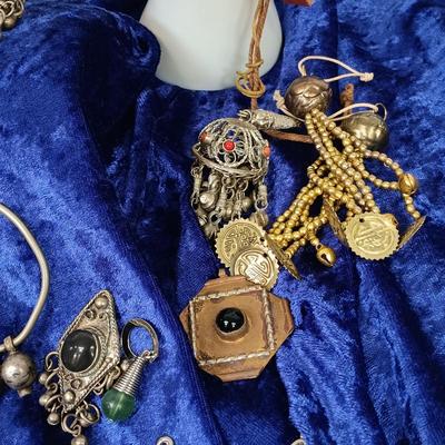 LOT 145: Moroccan Pendants, Bracelets, Belt & More