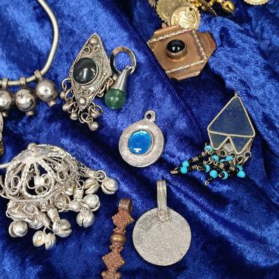 LOT 145: Moroccan Pendants, Bracelets, Belt & More