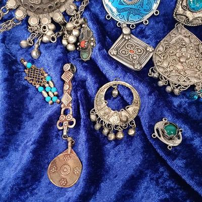 LOT 145: Moroccan Pendants, Bracelets, Belt & More