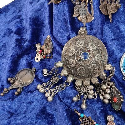 LOT 145: Moroccan Pendants, Bracelets, Belt & More