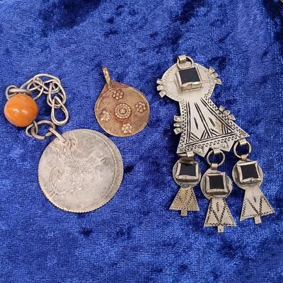 LOT 145: Moroccan Pendants, Bracelets, Belt & More