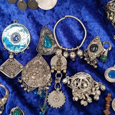 LOT 145: Moroccan Pendants, Bracelets, Belt & More